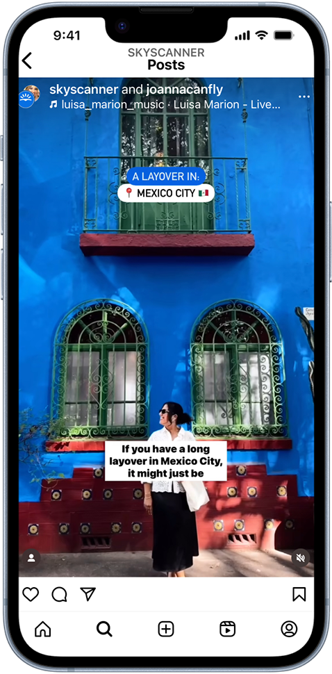 Smartphone showing a post by a Skyscanner creator of a blue building in Mexico City